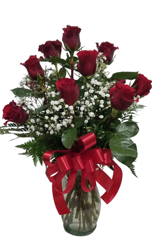 Traditional dozen of roses in vase
