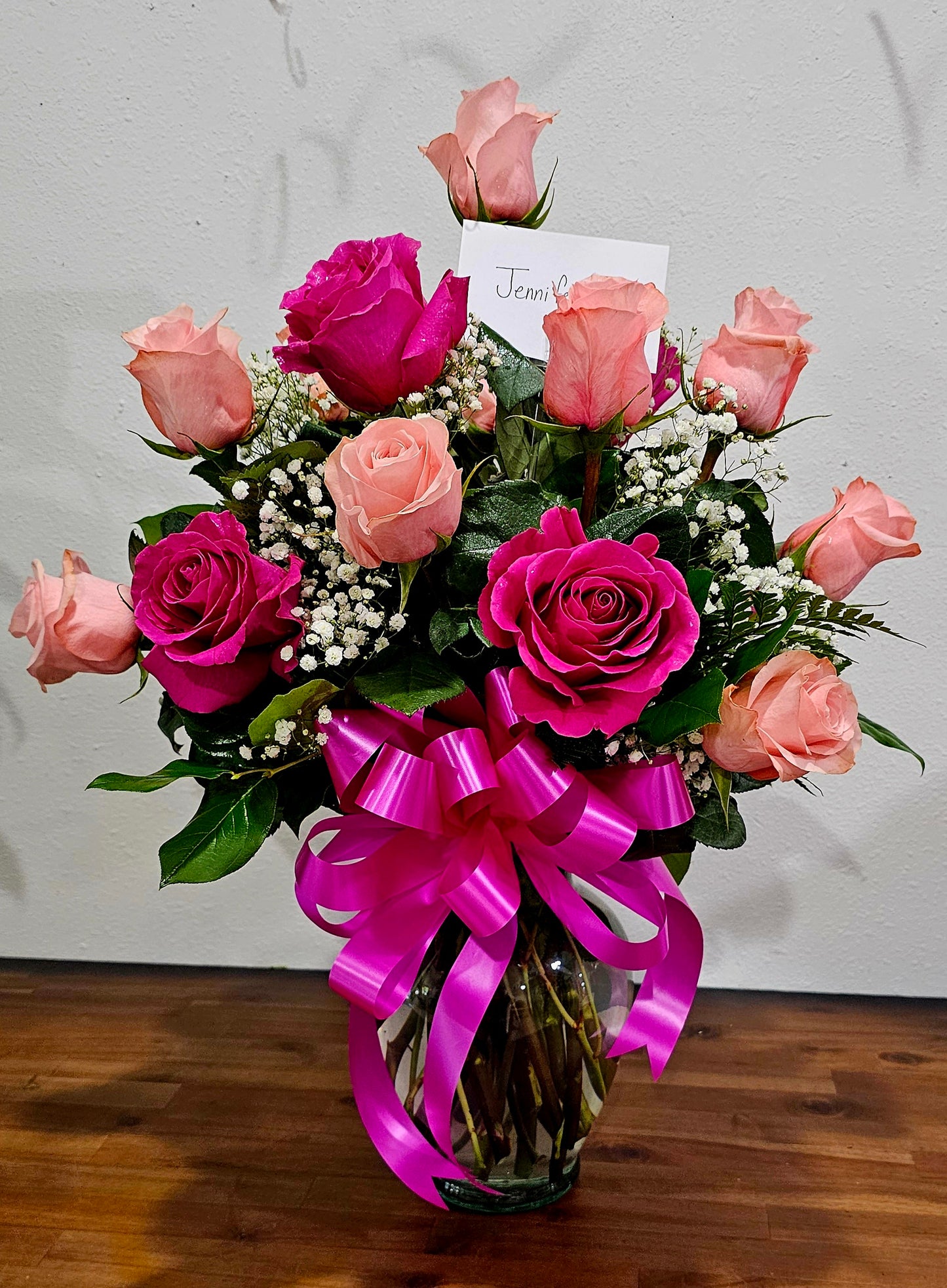 Traditional dozen of roses in vase